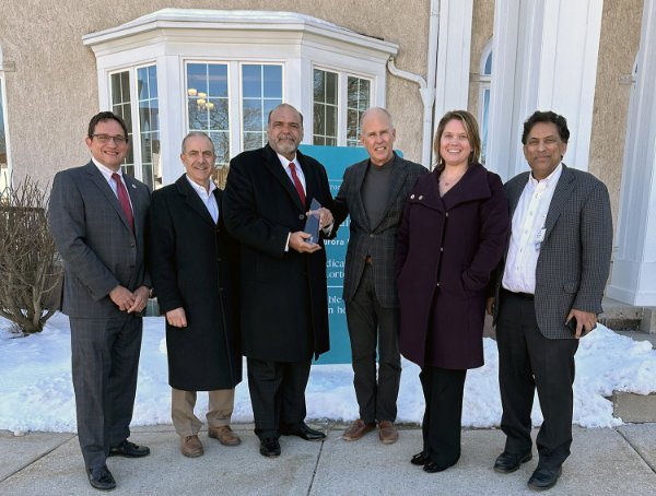 Pete Carlson receiving WHA's Distinguished Service Award