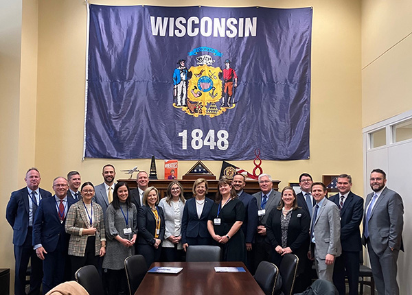 Hospital and health system leaders with Sen. Baldwin